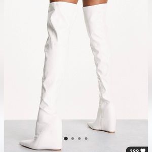 Tall white boots